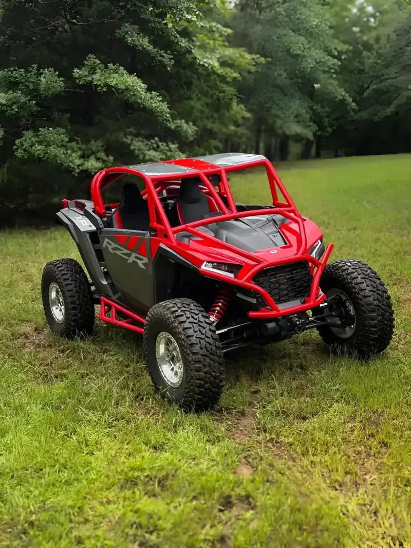Custom side-by-side UTV parked outside the Backwoods Off-Road and Fab shop